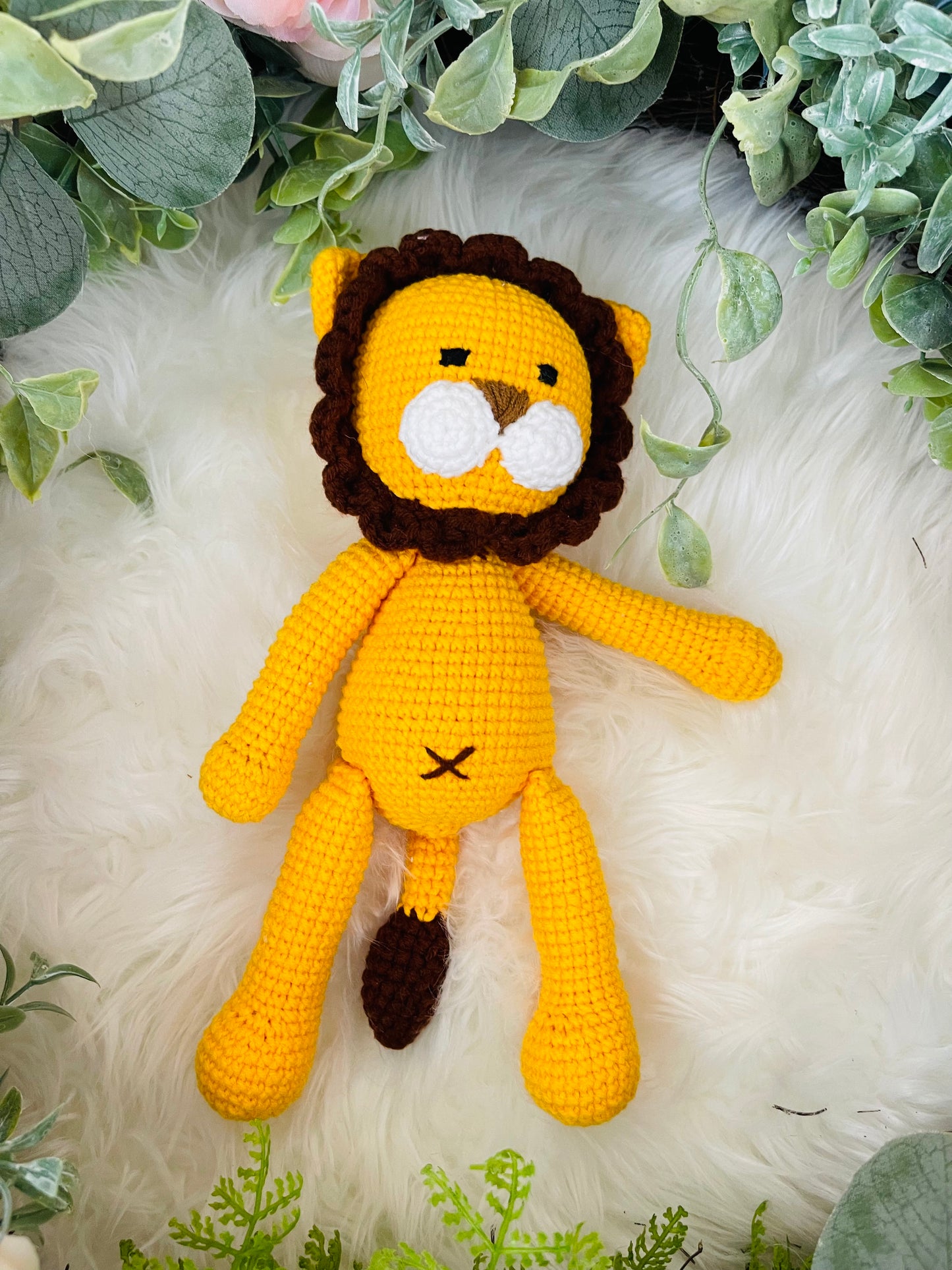 Crochet Lion Toy with Teething Rattle and Pacifier Holder.