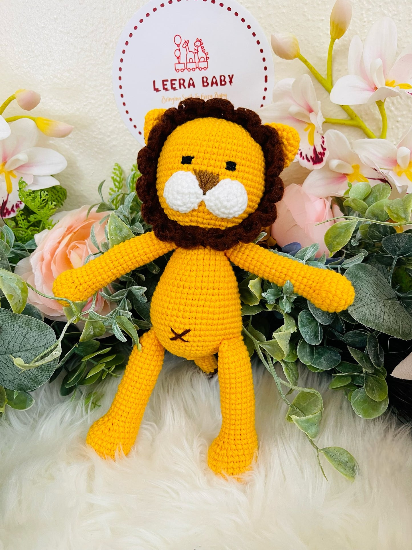 Crochet Lion Toy with Teething Rattle and Pacifier Holder.