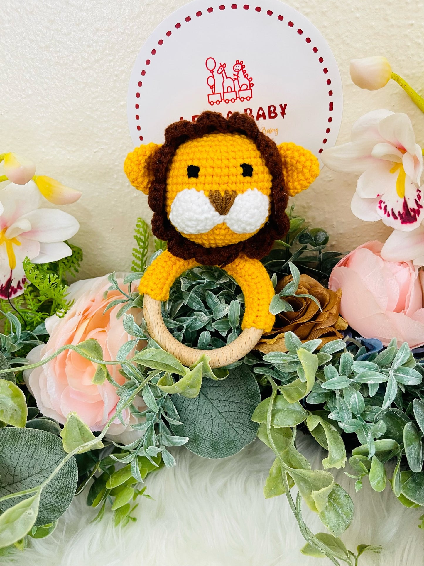 Crochet Lion Toy with Teething Rattle and Pacifier Holder.