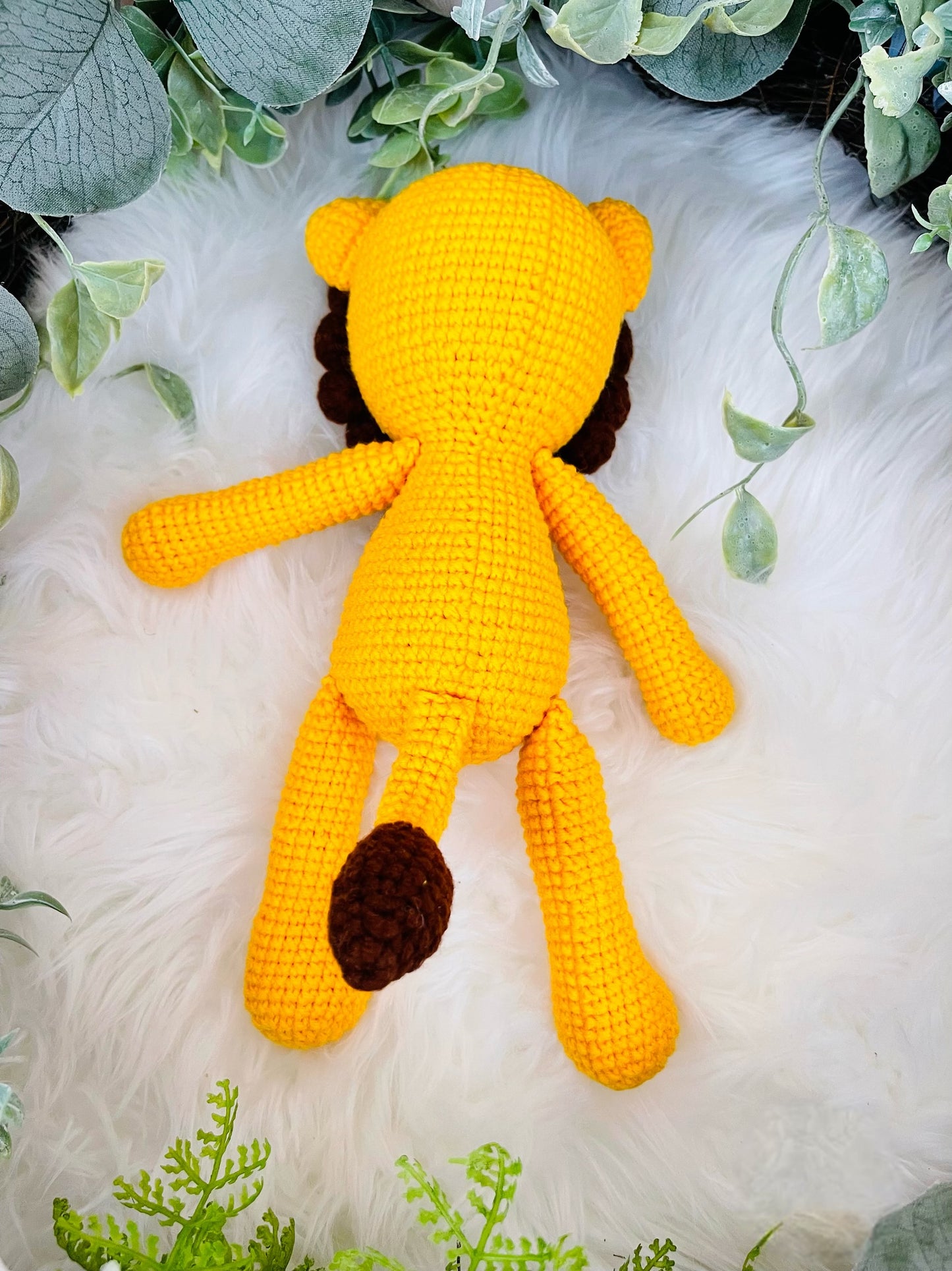 Crochet Lion Toy with Teething Rattle and Pacifier Holder.